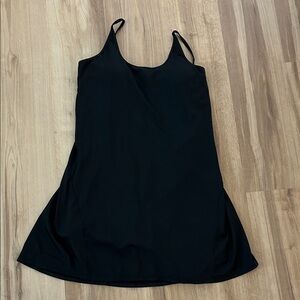 Black active dress with built-in shorts. Size large.